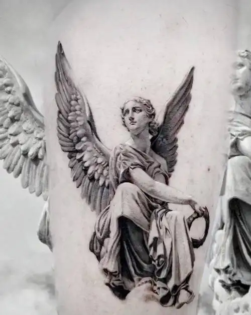 天使雕塑纹身图片_腿部欧美写实纹身图案