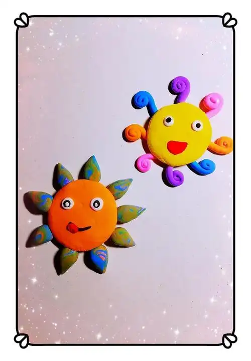 我们不仅可以用粘土制作太阳,还可以用手中的画笔画出温暖的太阳哦!