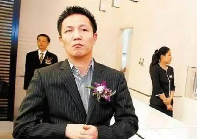 上海"首富"周正毅的江湖路:纵横商政两界,终落法网_欲望_因为_馄饨