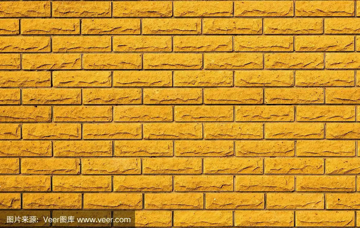 从黄色瓷砖墙壁的纹理.建设背景