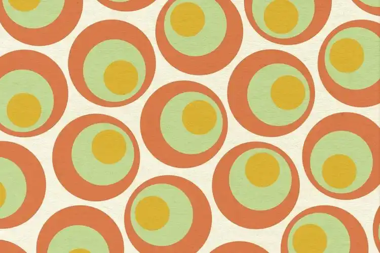 白色背景橙绿黄球形图案图片