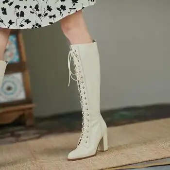 aty轻奢品牌长靴女不过膝2022年冬季新款真皮绑带高跟骑士靴粗跟白色