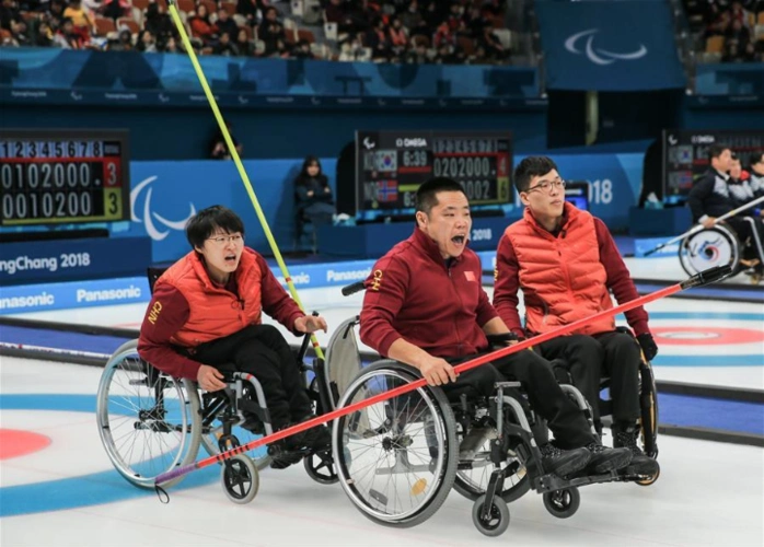 2018平昌冬残奥会轮椅冰壶比赛.图片来自新华社