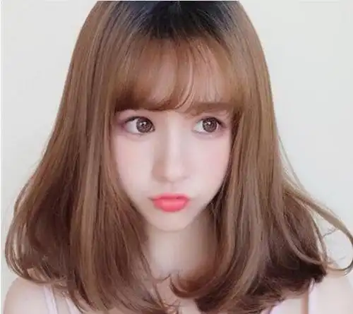 内扣梨花烫中长发发型图片