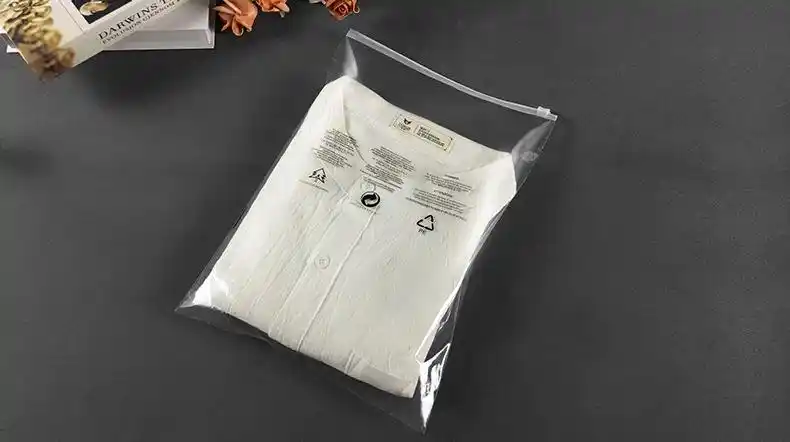 服装拉链袋塑料袋衣服外贸包装袋25*30cm警告语透明袋批发