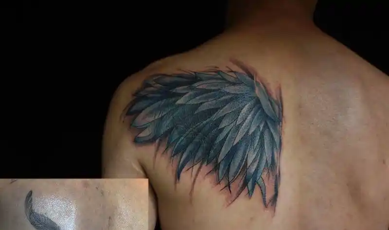 翅膀 遮盖纹身图片_背部水彩纹身图案