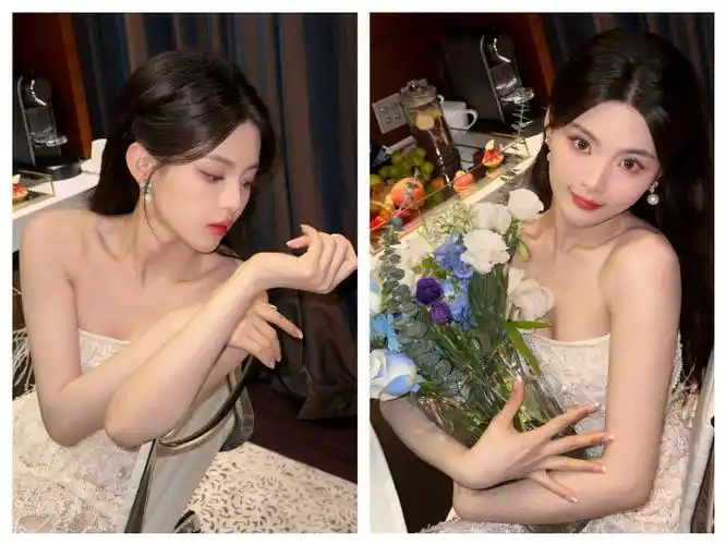 杨超越今日上海时装周造型,身穿白色钉珠蕾丝礼服,轻盈羽毛,珍珠痘贩