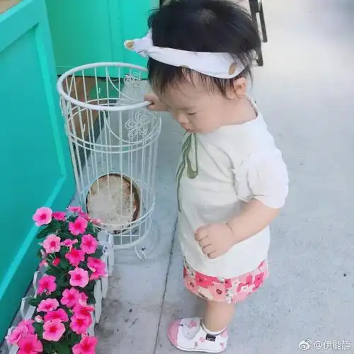 组图:小米粒奔跑满头大汗到模糊 伊能静直呼风一样的女子