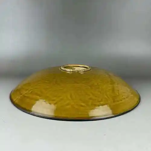 定窑酱釉印工仙鹤缠枝花卉盘