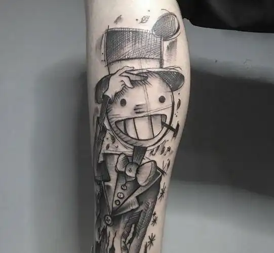 稻草人纹身图片_腿部纹身图案