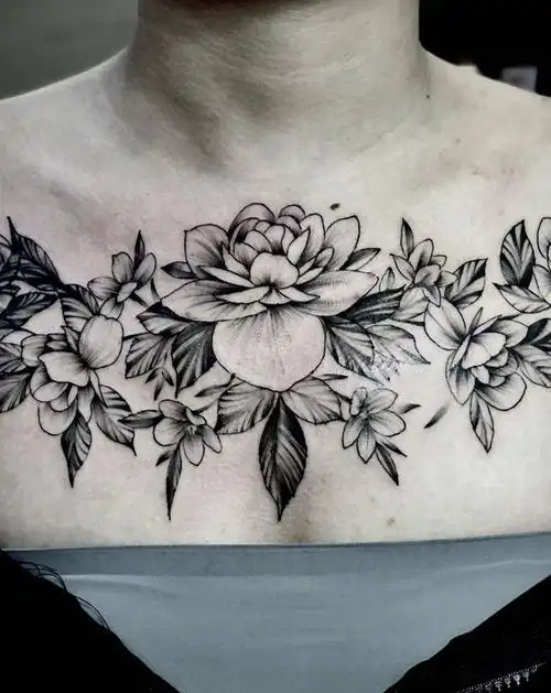 遮盖小灰机纹身图片_胸部纹身图案