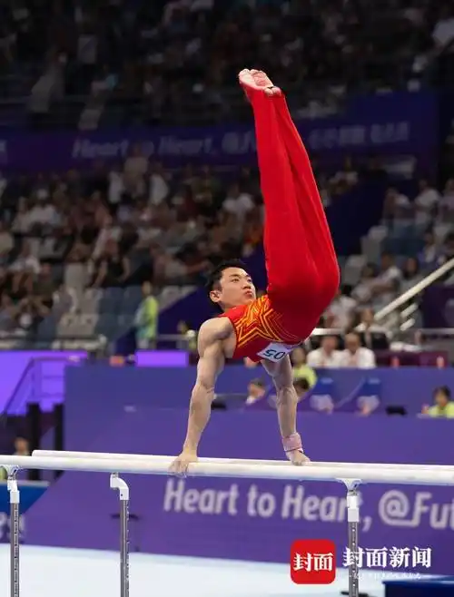 亚运会双杠卫冕,邹敬园捍卫"地表最强"|图集_比赛_金牌_图片