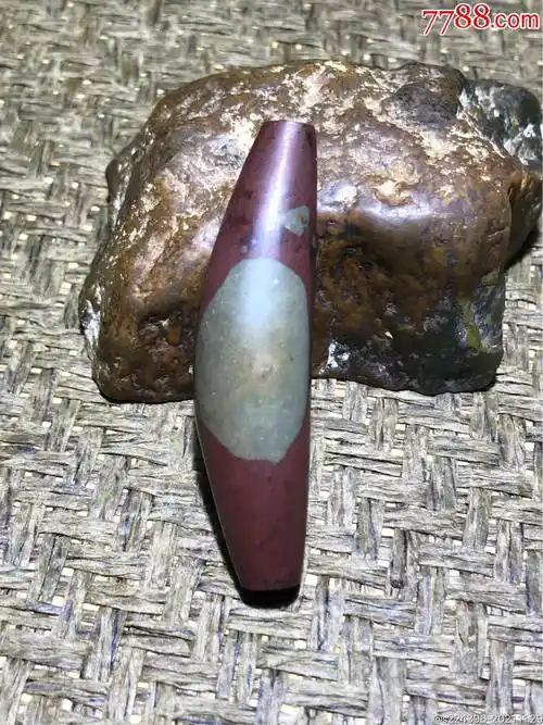 天然方成朱砂凤眼石牛角天眼天珠一颗