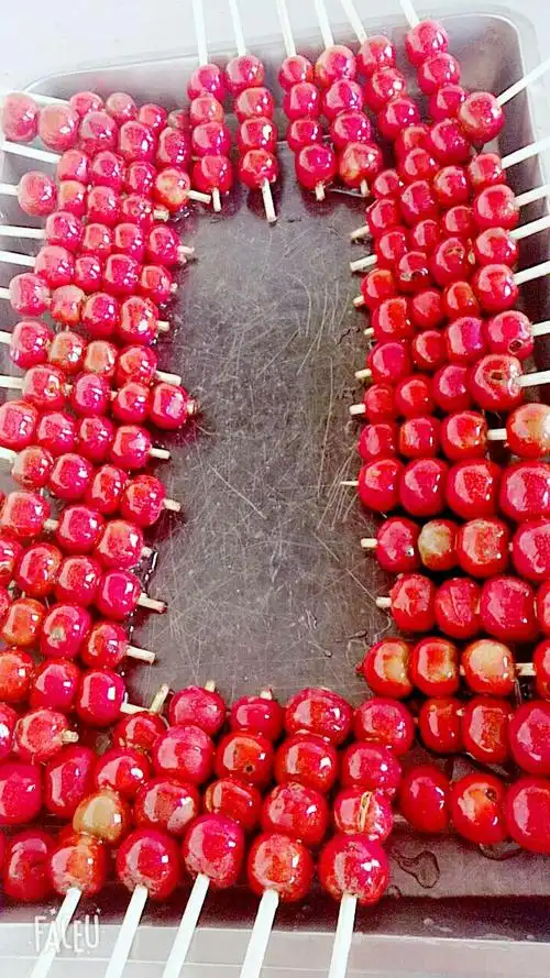 中国娃娃幼儿园宝贝儿们吃冰糖葫芦表情秀