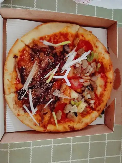 必胜客外卖披萨的料也放的太少了吧