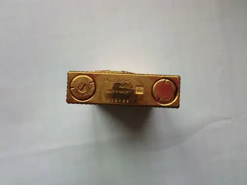 帮帮看看真假 都彭打火机 9几年买的 证书保修卡都丢了 找不到 买的