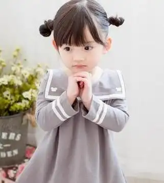 儿童两个丸子头的扎法效果图 示范儿童可爱丸子头如何扎