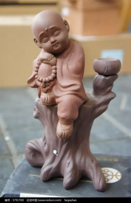 思考的泥塑和尚