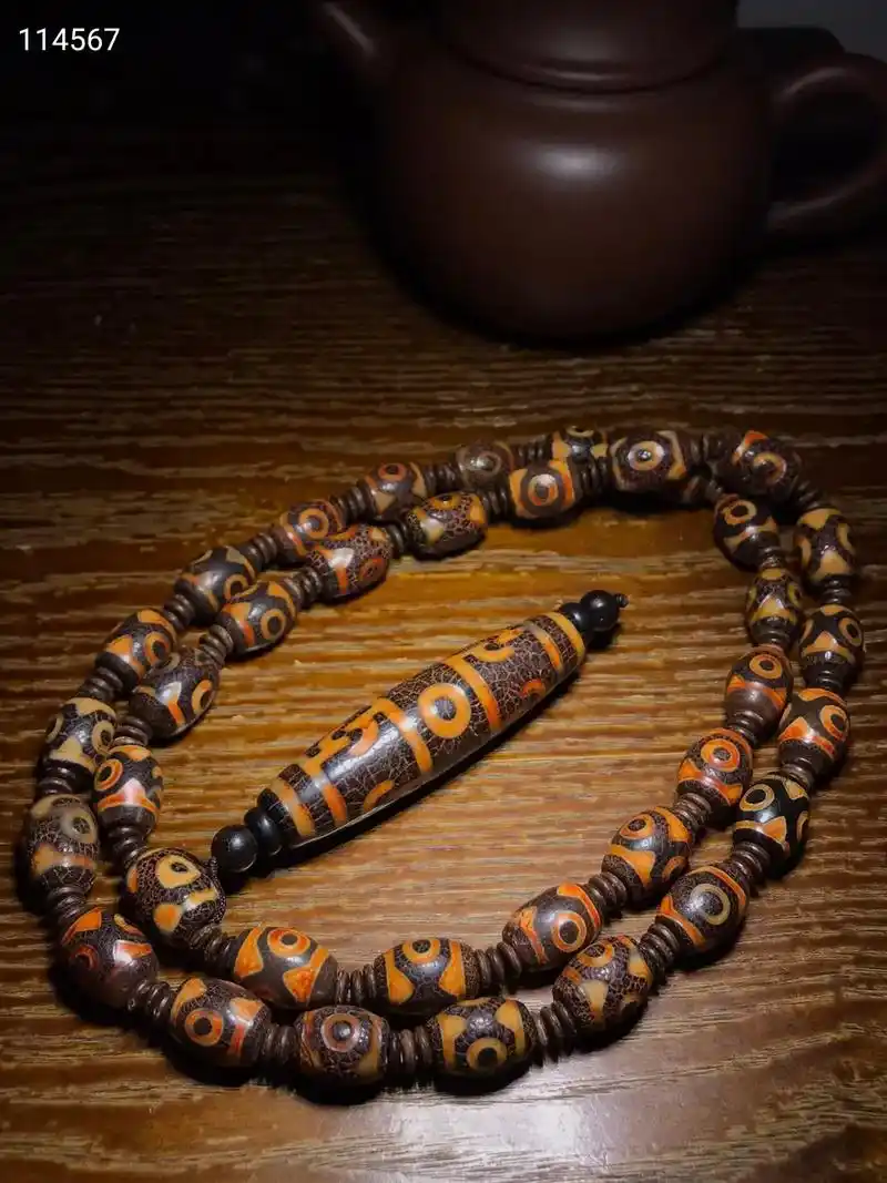 火供龙纹老玛瑙牙黄三眼天珠配莲师法器三眼天珠佛珠念珠项链 - 抖音