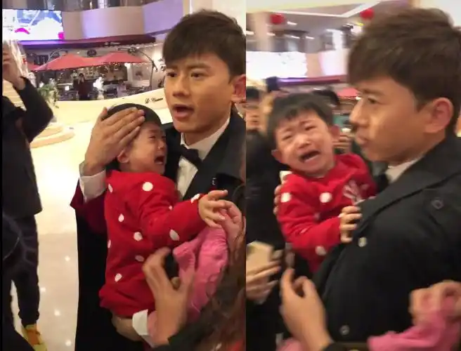 张杰春晚彩排后台抱起被撞倒的小孩 严厉责问肇事者却惹非议