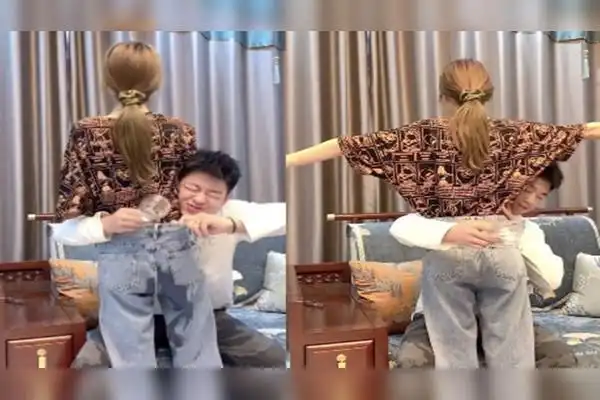 男子挑战抱女友腰喝水不料抱住女友后水往她屁股里倒直接原地爆炸