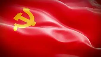 闪动的党徽和飘扬的红旗