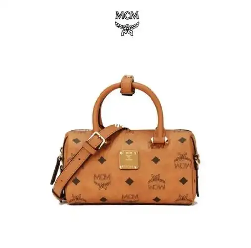 你的专属mcm包包mcm包包的功能款式包包各式各样但经典的是他的老花满