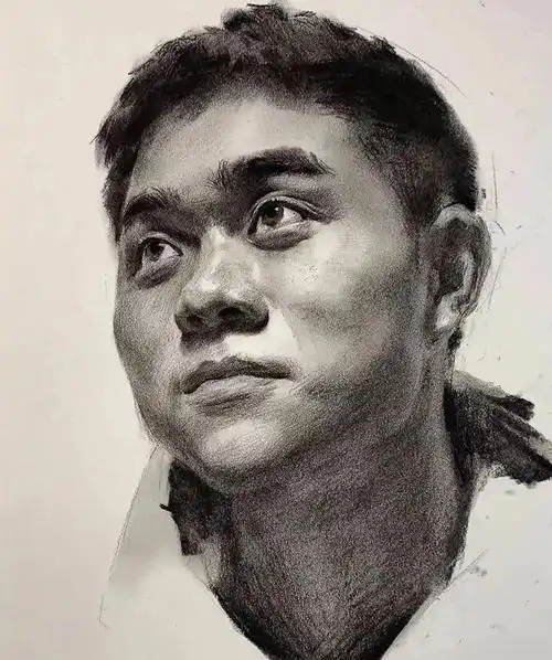 今天给大家分享一个素描头像绘画过程仰头的男青年