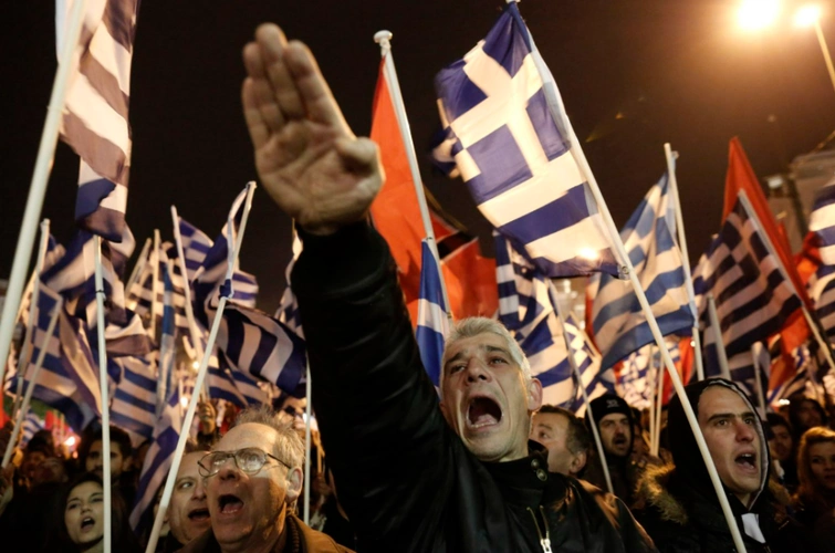 希腊极右翼政党金色黎明在2014年2月的一次集会上行纳粹礼,该政党在