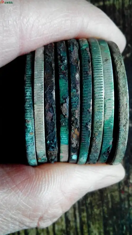 [讨论] 银元铁褐色锈的成因?