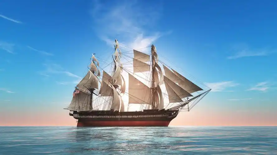 蓝色天空下正在行驶的帆船坚持蓝色大海杨帆起航