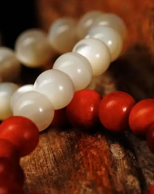 如谜系列印尼进口血龙木珍珠贝手串