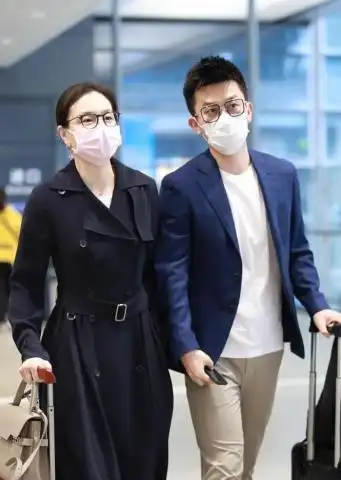 吴敏霞男朋友(35岁吴敏霞携老公现身机场)(1)