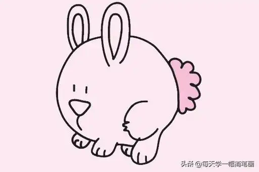 2,然后在画好的圆上面画上小兔子的两只耳朵.