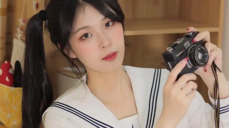 双马尾美女青春迷人写真