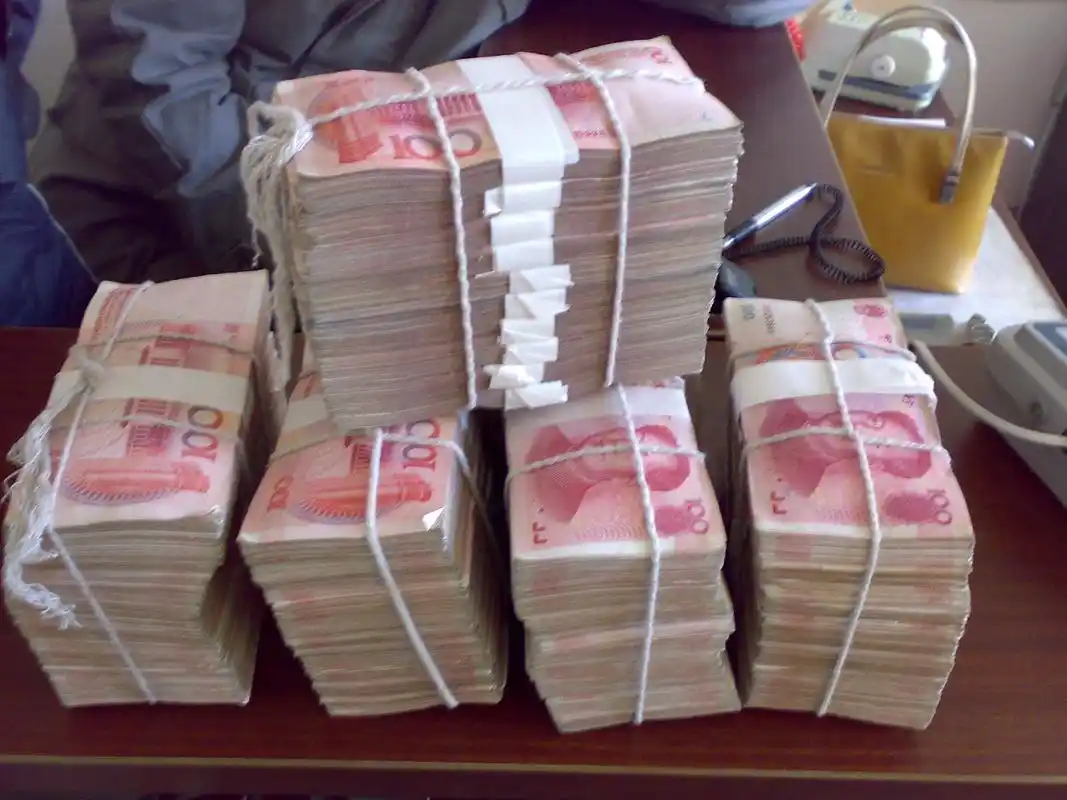 50万存银行和50万买房哪个划算?