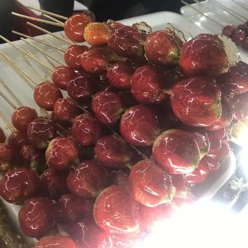 都说冰糖葫芦儿酸