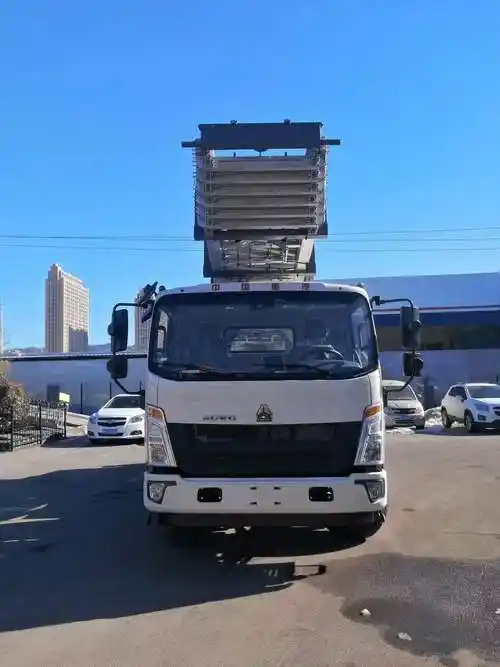 重汽豪沃悍将国六45米云梯搬家作业车图片