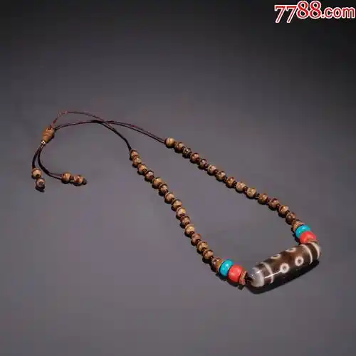 旧藏八眼天珠搭配沉香圆珠链挂件