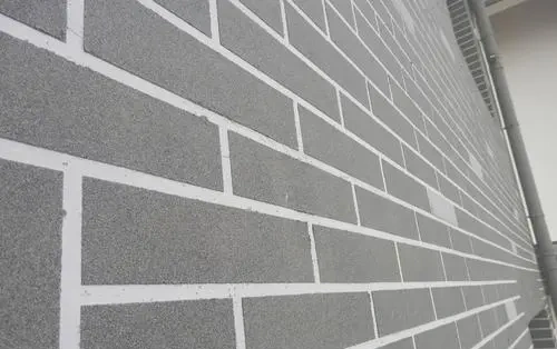 真石漆施工为什么要做分格?可不只是好看而已!